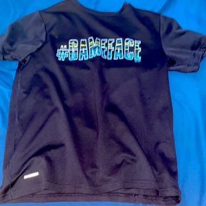 Tshirt youth large(12-14). Good condition with minor tears that aren’t visible.